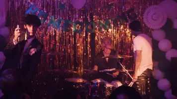 Travis Barker, Jaden Hossler kick Machine Gun Kelly off the stage